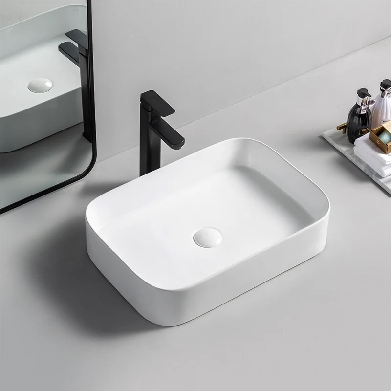 Fregadero de baño moderno de porcelana rectangular con lavabo de drenaje emergente Clearhalo