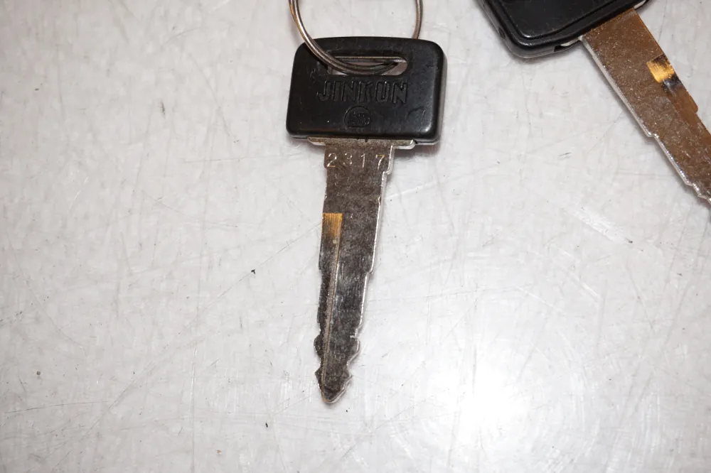 cerradura de sillín Suzuki