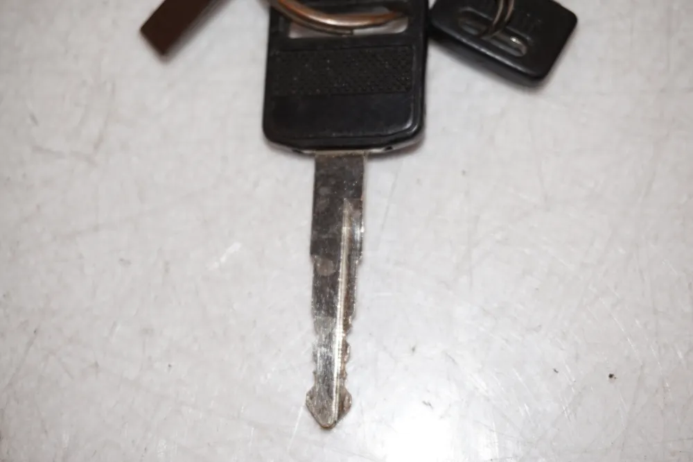 cerradura de sillín Suzuki